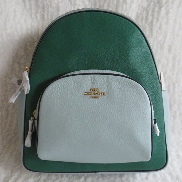 coach court backpack in colorblock Outlet Refined pebble leather Inside zip and multifunction pockets Double zip closure fabric lining Handle with 2 1/4 drop Outside zip pocket Adjustable shoulder straps 10 3/4 (L) x 12 1/2 (H) x 4 3/4 (W) Style No. Coach Court Backpack in Colorblock